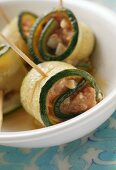 Courgette rolls with mozzarella and tomato filling