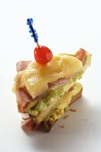 Ham & cheese on toast with pineapple, avocado cream & cherry