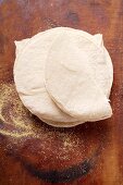 Wheat tortillas on wooden background