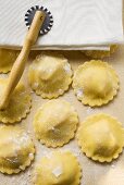 Home-made ravioli with pastry wheel