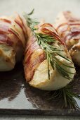 Chicken breast wrapped in bacon with rosemary