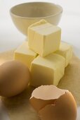 Cubes of butter, egg and eggshells