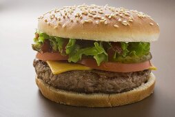 Cheeseburger with tomato, lettuce and ketchup