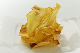 Deep-fried ginger slices on plate