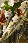 Fried anchovies with dried tomatoes (Calabria)