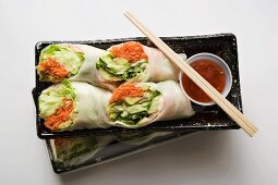 Vietnamese spring rolls with chili sauce to take away