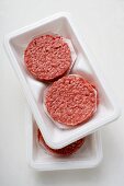 Raw burgers for hamburgers in packaging