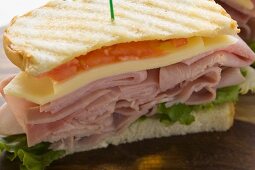 Toasted ham, cheese and tomato sandwich