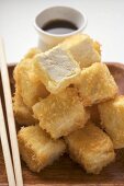 Breaded tofu cubes with soy sauce (Asia)