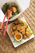 Asian chicken nuggets with apricot sauce to take away