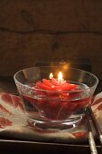 Asian table decoration: floating flower candle