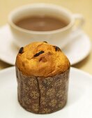 Mini-panettone and cup of coffee