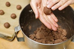 Forming hazelnut dough into small balls