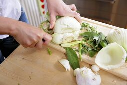 Removing the stalk from a Florence fennel bulb