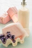 Soap and lavender flowers in a shell