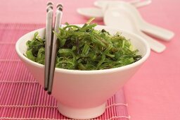 Seaweed salad with chopsticks