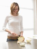 Woman preparing kohlrabi