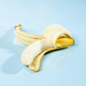 A half-peeled banana