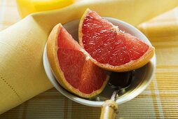 Grapefruit wedges in a bowl