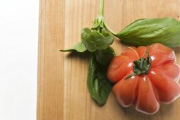 Red beefsteak tomato and basil