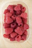 Raspberries in plastic punnet