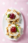 Waffles with vanilla cream and cherries