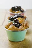 Individual bread puddings with cherries