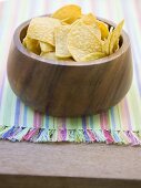 Tortilla chips in wooden bowl