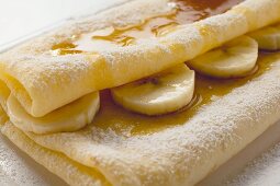 Crêpes with bananas and maple syrup