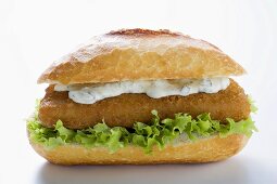 Fish burger with remoulade and lettuce