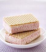 Two raspberry ice cream sandwiches