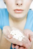 Tabletten auf einer Hand