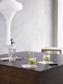 Two Mojitos on wooden table