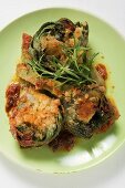 Stuffed artichokes with gratin topping