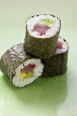 Maki sushi with tuna, cucumber and avocado