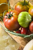 Assorted tomatoes in wire basket