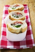 Sandwich rolls filled with pork and peppers