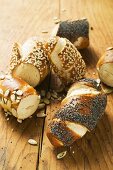 Assorted pretzel rolls on wooden background