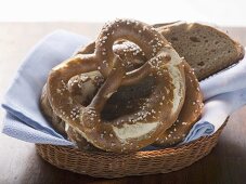 Soft pretzels and bread in bread basket