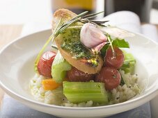 Risotto with vegetables, crostini, pesto and rosemary