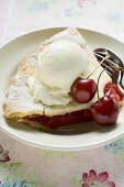 Piece of cherry pie with vanilla ice cream & fresh cherries (USA)