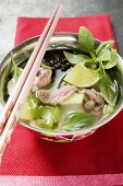Turkey and lemon grass soup with limes and Thai basil (Asia)