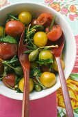 Tomato salad with capers and herbs (overhead view)