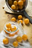 Mirabelles with sugar and preserving jar