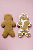 Two gingerbread men, one plain and one iced