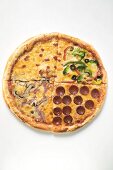 US-style ham, pepperoni and vegetable pizza in quarters