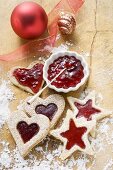 Star- and heart-shaped biscuits with raspberry jam
