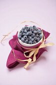 Blueberries in white bowl to give as a gift