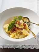 Tortellini with tomato sauce, basil and Parmesan
