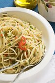Spaghetti with chillies and herbs, olive oil